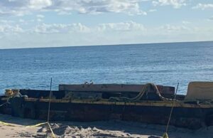 DEERFIELD BEACH STILL HAS BARGE ON SHORE