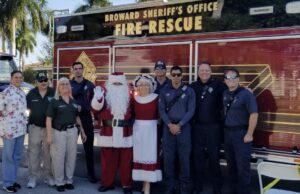 BROWARD SHERIFF’S FIRE RESCUE ESCORT SANTA AND MRS.CLAUS TO BUTLER HOUSE IN DEERFIELD BEACH