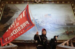 JUSTICE DEPARTMENT-THIRTEEN RIOTERS CHARGED IN FEDERAL COURT